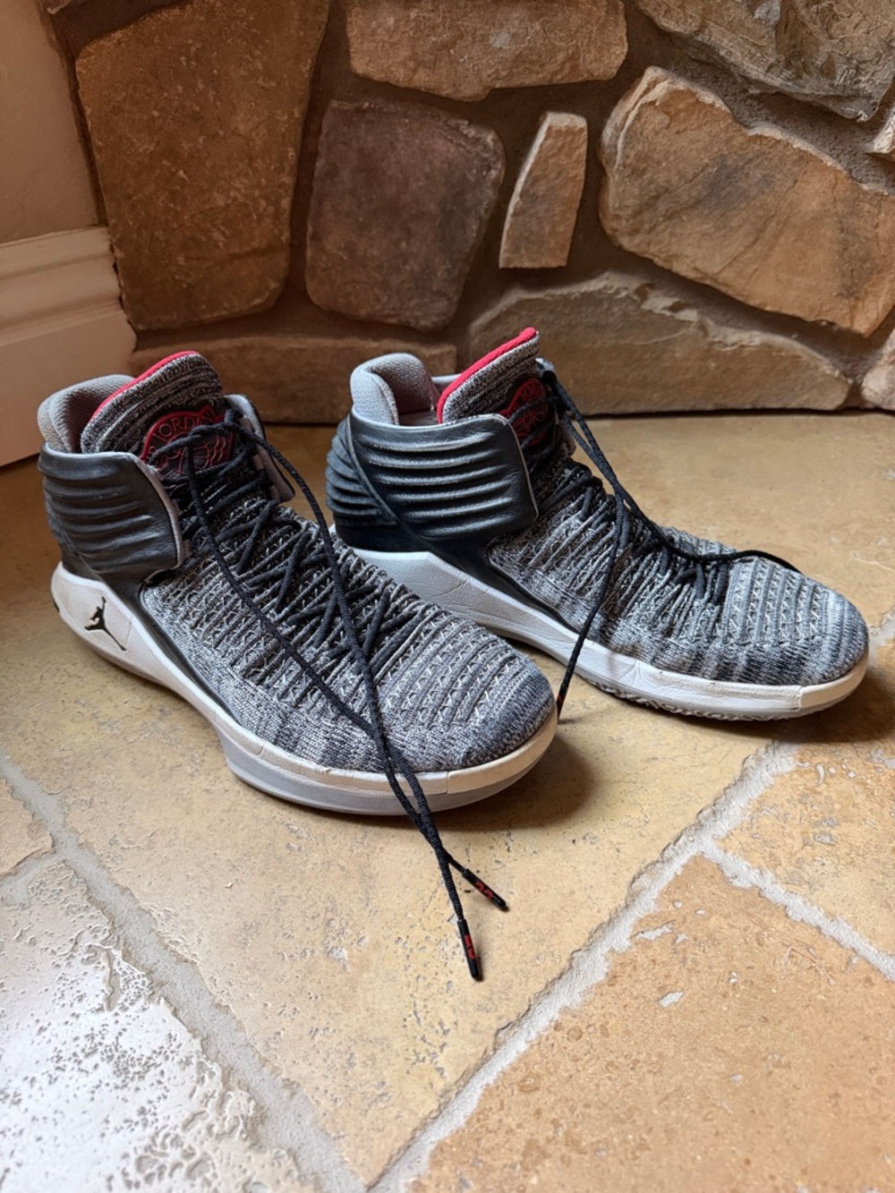 Jordan Grey Flyknit High-Top Sneakers with Red Accents